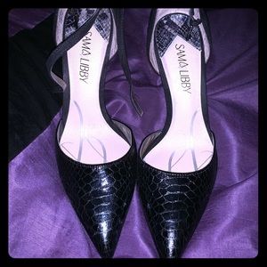 Women’s size 8 high heel with ankle strap.